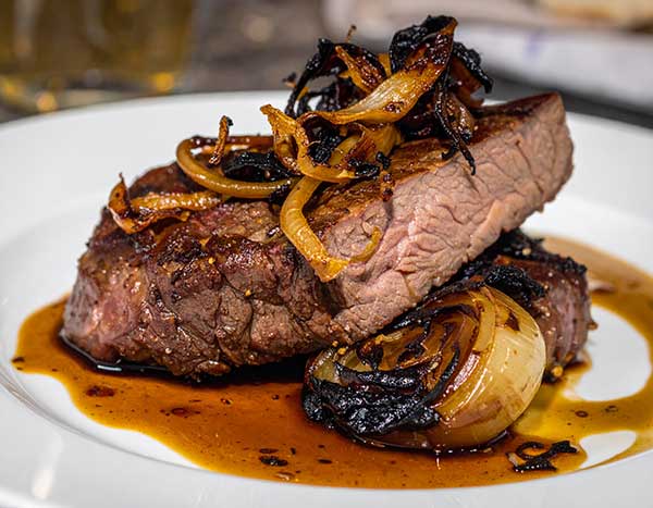 Alberta bison with black garlic and ember-roasted onion